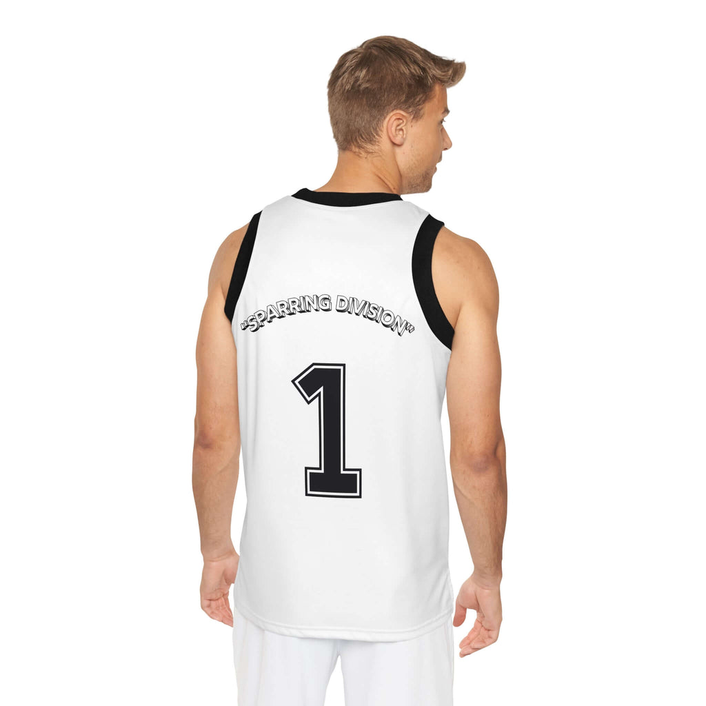 Back view of male model wearing Team Sharkcage black basketball tank top featuring large colored logo.