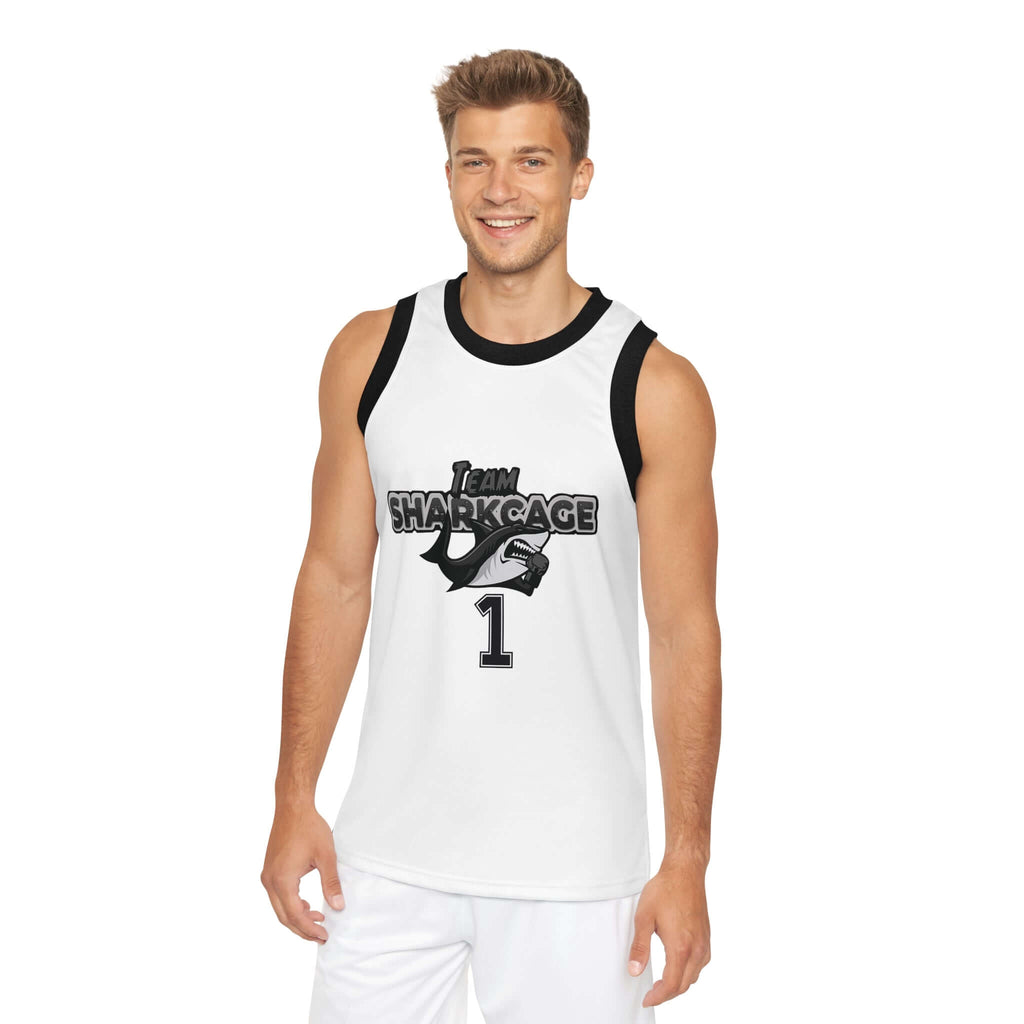 Front view of male model wearing black Team Sharkcage basketball tank top with vibrant colored logo.