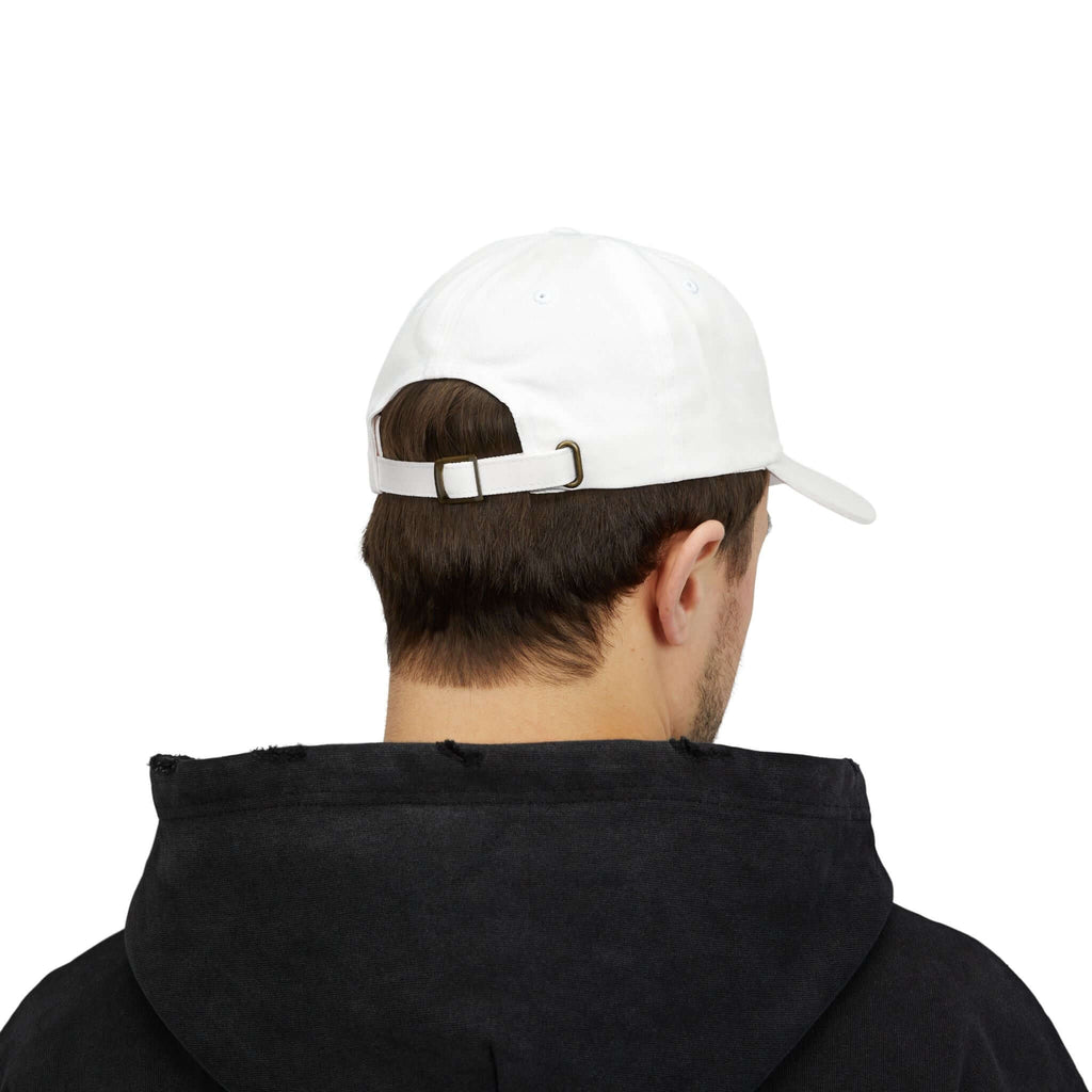 Back view of a man wearing a white classic cap with adjustable strap, styled casually.